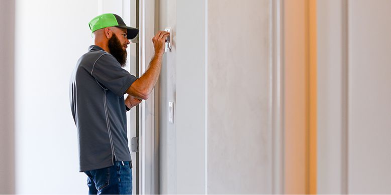 An HVAC technician | Nest Thermostat Repair